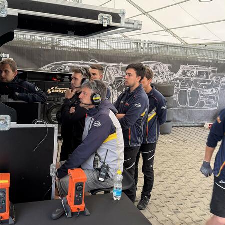R. Šenkýř and the technicians are monitoring the cars' live...