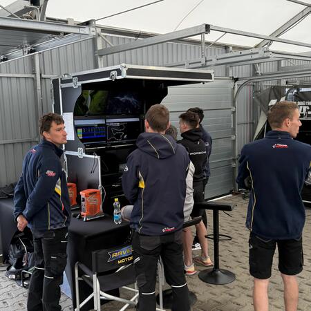 R. Šenkýř and the technicians are monitoring the cars' live...