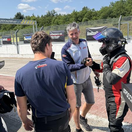 Great excitement in the pit lane after the finish of the...