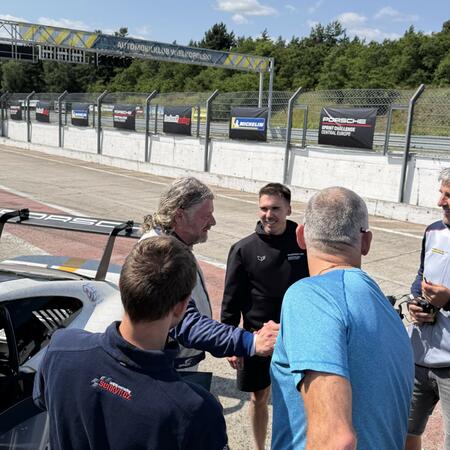 Great excitement in the pit lane after the finish of the...