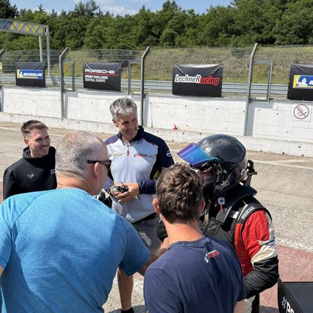 Great excitement in the pit lane after the finish of the...