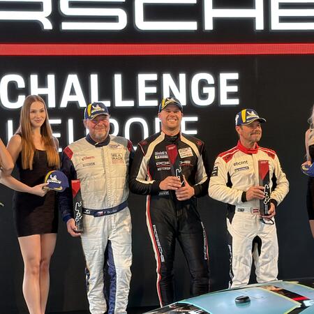 Pavel Bouška receives the trophy for second place in the...