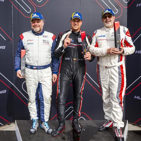Pavel Bouška receives the trophy for second place in the...