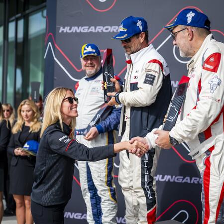Pavel Bouška receives the trophy for second place in the...